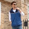 O1CN012k0xtP1aQtddsMAb8_2212029483325-0-cib.jpg Color-blocked padded vest with a hat, short style, and added cotton.