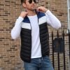 O1CN01chB9gE1aQtdcAWBCN_2212029483325-0-cib.jpg Color-blocked padded vest with a hat, short style, and added cotton.