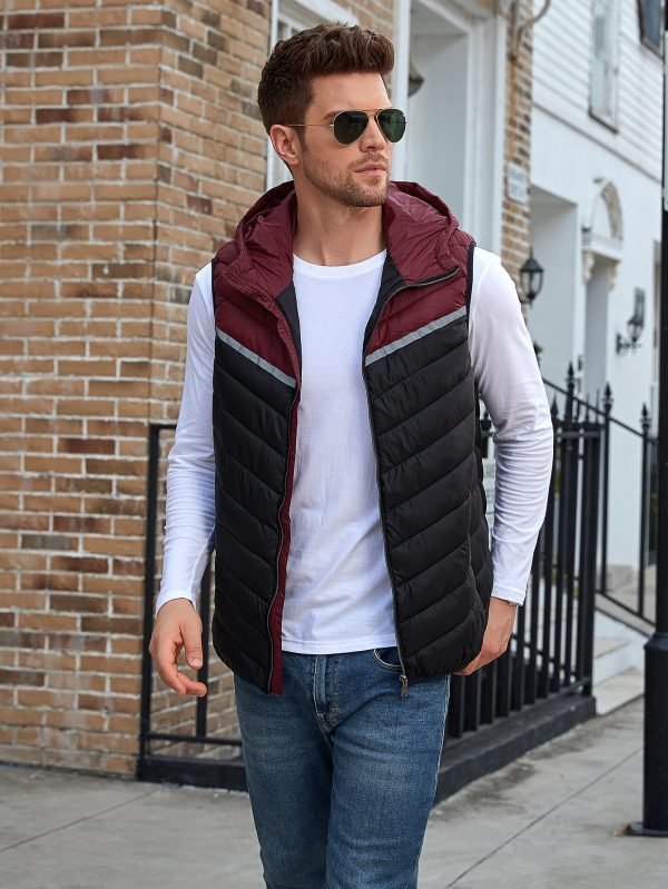 O1CN01zcweOO1aQtdWIgjgx_2212029483325-0-cib.jpg Color-blocked padded vest with a hat, short style, and added cotton.